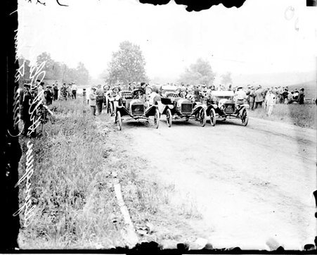 Three automobiles parked next to one another on a road during the Algonquin Hill Climbing Contest - Chicago Daily News, Inc.