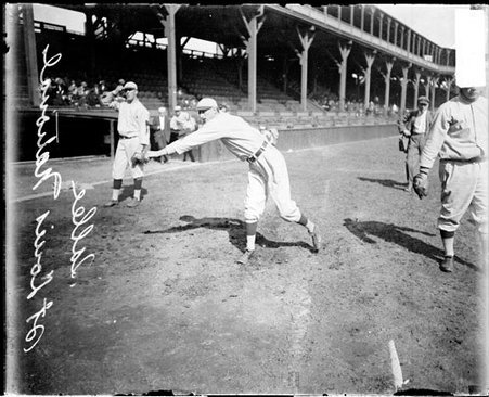 Baseball player Sallee, St. Louis Cardinals, following through after throwing a baseball at West Side Grounds - Chicago Daily News, Inc.