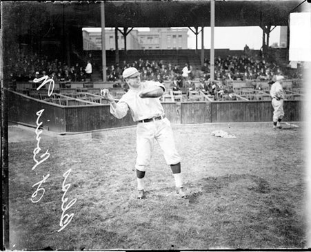 Baseball player Bliss, St. Louis Cardinals, cocking his arm to throw a baseball at West Side Grounds - Chicago Daily News, Inc.