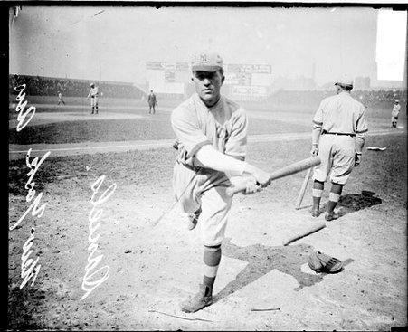 Baseball player Daniels, New York Highlanders, following through after swing a baseball bat at Comiskey Park - Chicago Daily News, Inc.