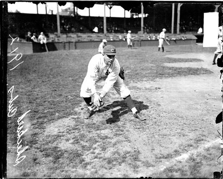 Baseball player J. T. Sheckard, standing in a fielding position on the field at West Side Grounds - Chicago Daily News, Inc.