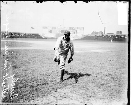 Baseball player, Lively, Detroit Tigers, following through after throwing a baseball, standing on the field at Comiskey Park - Chicago Daily News, Inc.