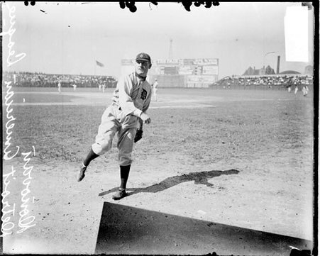 Baseball player, Donovan, Detroit Tigers, following through after throwing a baseball, standing on the field at Comiskey Park - Chicago Daily News, Inc.