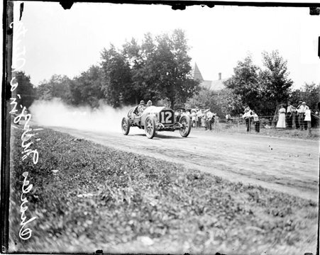 Automobile driver Charles Merz driving a Stutz automobile in Elgin during an automobile race - Chicago Daily News, Inc.