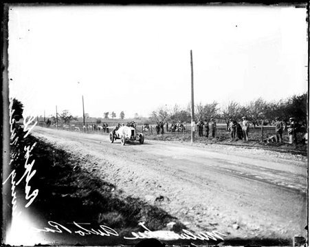 Automobile driver DePalma driving a Mercedes automobile on a dirt road during the Vanderbilt Cup automobile race - Chicago Daily News, Inc.