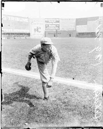 Baseball player, Schupp, Giants, following through after throwing a baseball, standing on the field - Chicago Daily News, Inc.