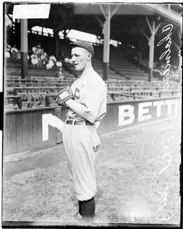 Baseball player, Chalmers, Phillies, standing in front of grandstands on the field at West Side Grounds - Chicago Daily News, Inc.