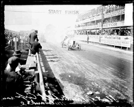 Unidentified automobile driver driving an automobile during the start of the Vanderbilt Cup automobile race - Chicago Daily News, Inc.