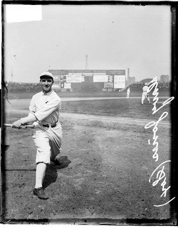 Baseball player, Davy Jones, White Sox, following through after swinging a baseball bat on the field at Comiskey Park - Chicago Daily News, Inc.
