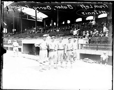 Baseball players Baker, Barry, Collins, and McInnis, Philadelphia Athletics, standing in front of at Comiskey Park - Chicago Daily News, Inc.