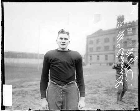 University of Chicago football player McConnell standing on the athletic field at Marshall Field - Chicago Daily News, Inc.