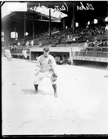 Baseball player, Baker, Detroit Tigers, standing in a ready position in front of grandstands on the field at Comiskey Park - Chicago Daily News, Inc.