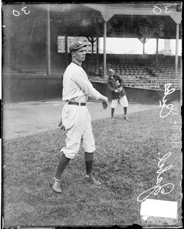 Baseball player, Zabel, Cubs, following through after throwing a baseball on the field at West Side Grounds - Chicago Daily News, Inc.