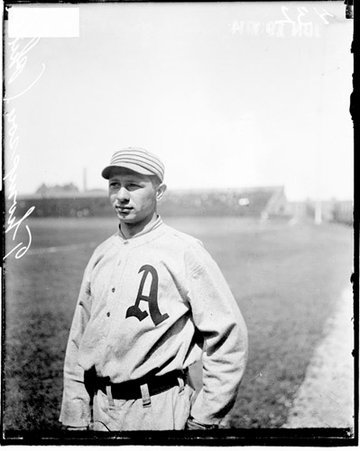 Baseball player, Thompson, Philadelphia Athletics, standing on the field at Comiskey Park - Chicago Daily News, Inc.