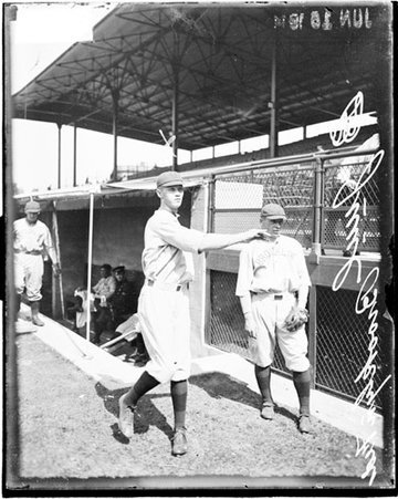 Brooklyn Federal League baseball player, Juul following through after throwing a baseball at Weeghman Park - Chicago Daily News, Inc.