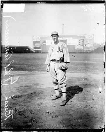 Baseball player, Bush, Philadelphia Athletics, standing on the field at Comiskey Park - Chicago Daily News, Inc.
