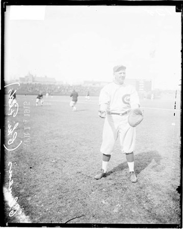 Baseball player, Whales team, Clemens standing in left foul zone holding glove - Chicago Daily News, Inc.