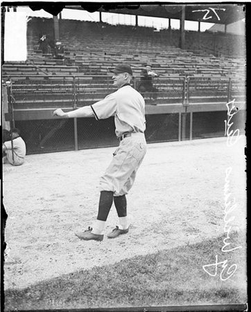Baseball player, Cubs, Williams throwing ball on field at Weeghman Park - Chicago Daily News, Inc.