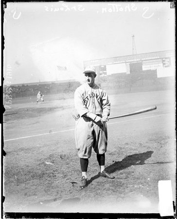 Baseball player, Shotten, St. Louis Browns, holding at bat at Comiskey Park - Chicago Daily News, Inc.