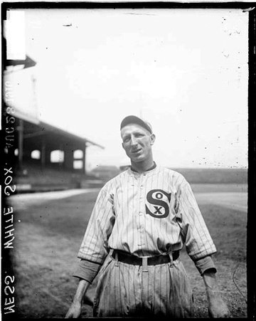 Baseball player, White Sox, Jack Ness standing on field at Comiskey Park - Chicago Daily News, Inc.
