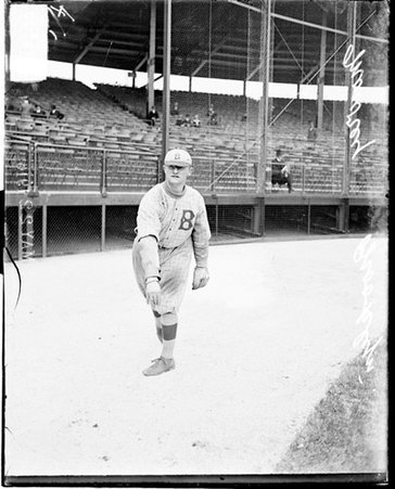 Baseball player, Brooklyn, Mowrey throwing ball on field at Weeghman Park - Chicago Daily News, Inc.