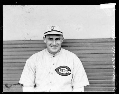 Baseball player, Toney, Cincinnati Reds, sitting in a dugout at West Side Grounds - Chicago Daily News, Inc.