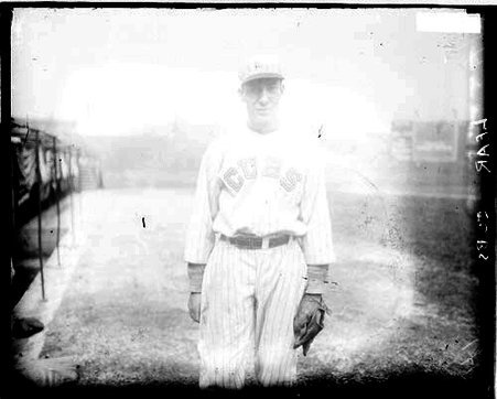 Baseball player, Lear, Cubs, standing on the field at Weeghman Field - Chicago Daily News, Inc.