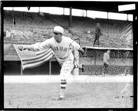 Baseball player, Weaver, Cubs, following through after throwing a baseball on the field at Weeghman Field - Chicago Daily News, Inc.