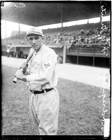 Baseball player, Rodriguez, New York Giants, holding a baseball bat, standing on the field at Weeghman Field - Chicago Daily News, Inc.