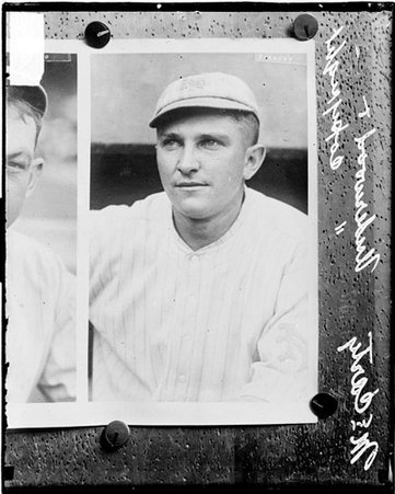 Baseball player, Giants, McCarty sitting or standing outdoors - Chicago Daily News, Inc.