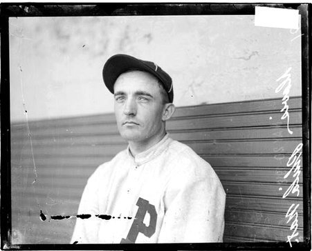 Baseball player, Philadelphia, Davis sitting in dugout at Weeghman Field - Chicago Daily News, Inc.