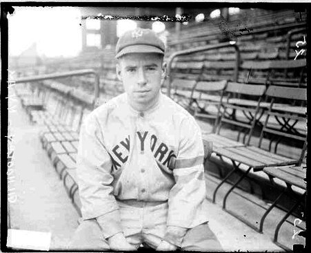 Baseball player, Gilhooley, Yankees, sitting in grandstands at Comiskey Park - Chicago Daily News, Inc.