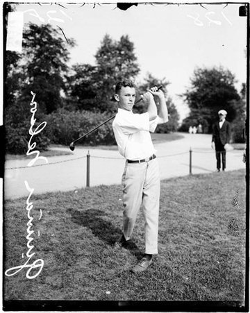 Golfer, Gunnar Nelson, following through after a swing, Jackson Park Golf Club - Chicago Daily News, Inc.