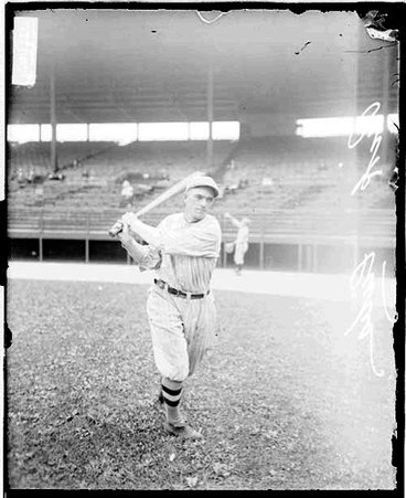Baseball player, Eddie Pick, Cubs, following through after a swing, light exposure - Chicago Daily News, Inc.