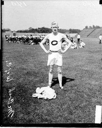 Track athlete, H.H. McCosh, standing at Stagg Field - Chicago Daily News, Inc.