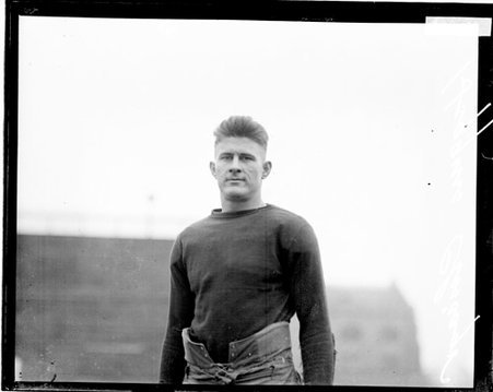 University of Chicago football player Charles Graham Higgins standing on the field at Stagg Field - Chicago Daily News, Inc.