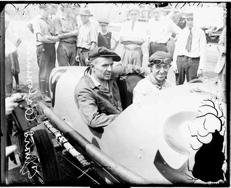 Motorist, Eddie O'Donnell and an unidentified man sitting in an automobile parked on the side of a road - Chicago Daily News, Inc.