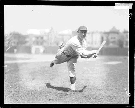 Baseball player, Tierney, Pittsburgh Pirates, following through after swinging a baseball bat at Weeghman Field - Chicago Daily News, Inc.