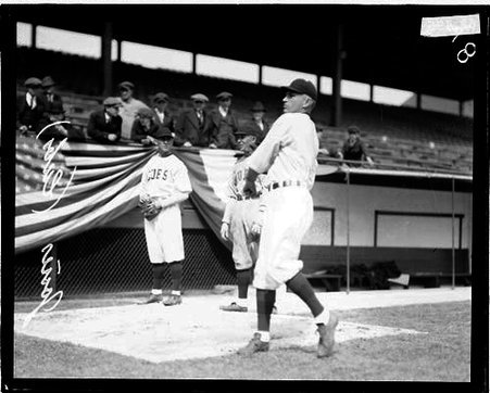 Baseball player Percy Jones, Cubs, following through after throwing a baseball on the field at Weeghman Field - Chicago Daily News, Inc.