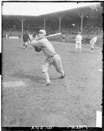 Baseball player, Bibb Falk, White Sox, following through after batting at Comiskey Park - Chicago Daily News, Inc.