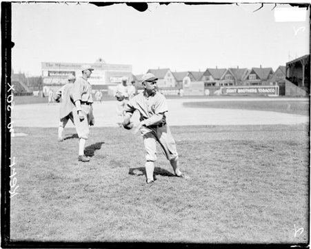 Baseball player, Dick Kerr, White Sox, following through after throwing a baseball at Comiskey Park - Chicago Daily News, Inc.