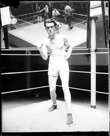Pugilist, Otto Von Porat standing in boxing stance in ring facing camera - Chicago Daily News, Inc.