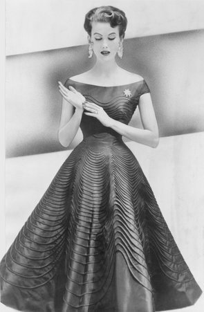 Model wearing corded taffeta cocktail dress.