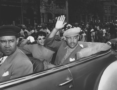 Joe Louis and his wife at the Bud Billiken Day parade - Chicago Daily News, Inc.