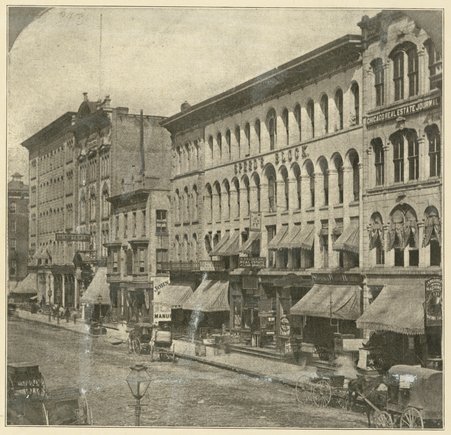 Dearborn street looking north from Madison - before fire- storefronts and Speed's Block building - Unknown