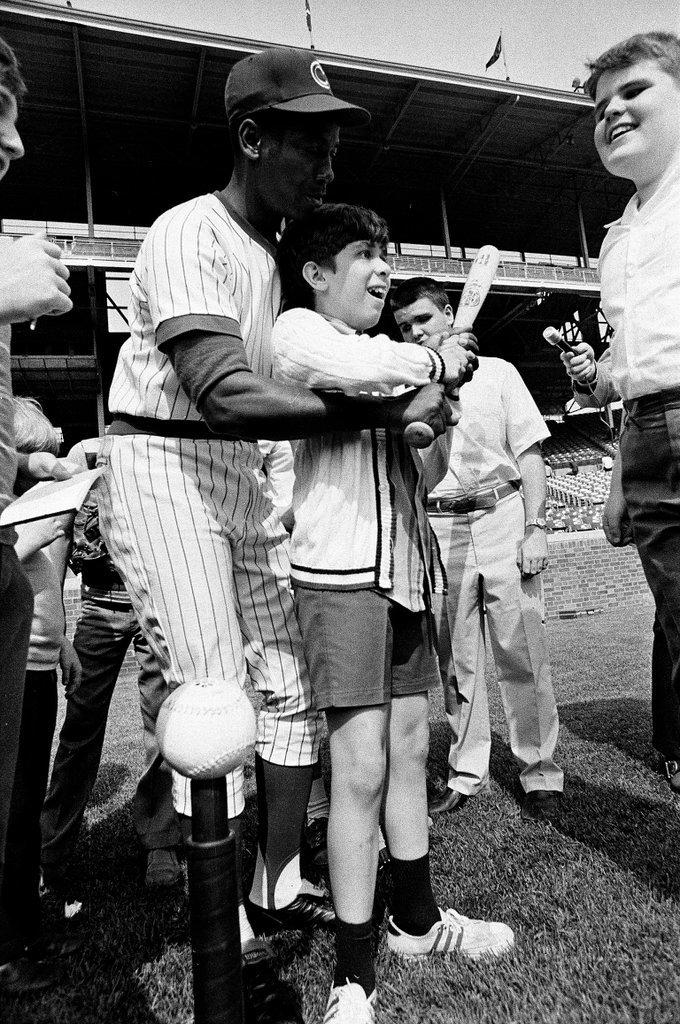 Cubs player Ernie Banks and coach Leo Durocher help blind students play baseball - Joe Kordick for Chicago Sun-Times