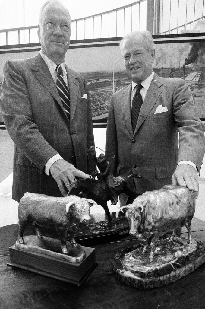 Members of the Chicago Historical Society look at memorabilia from the livestock exposition - M. Leon Lopez for Chicago Sun-Times