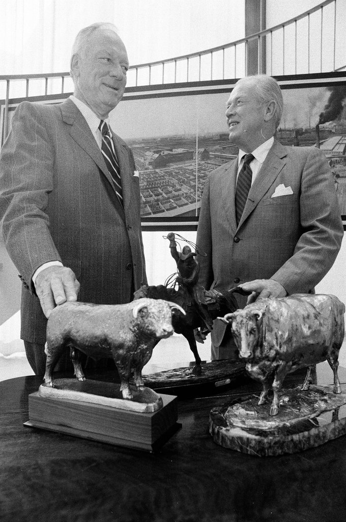 Members of the Chicago Historical Society look at memorabilia from the livestock exposition - M. Leon Lopez for Chicago Sun-Times