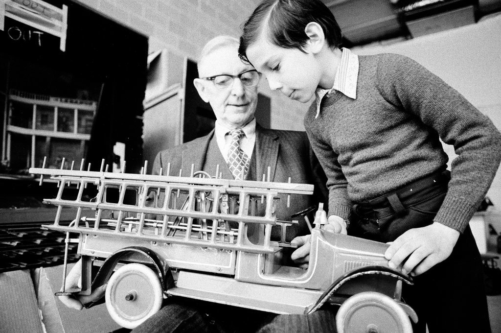 Dewey Ericsson and Rod Isaac Smilgof interact with model vehicles at the Chicago Historical Society - Jerry Tomaselli for Chicago Sun-Times