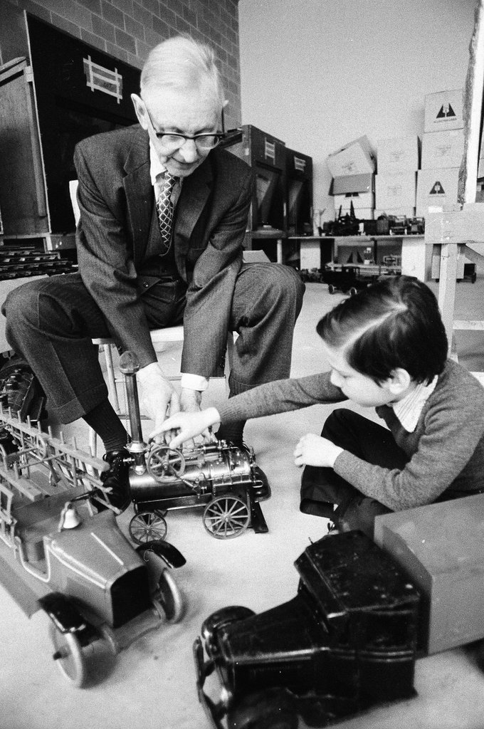 Dewey Ericsson and Rod Isaac Smilgof interact with model vehicles at the Chicago Historical Society - Jerry Tomaselli for Chicago Sun-Times